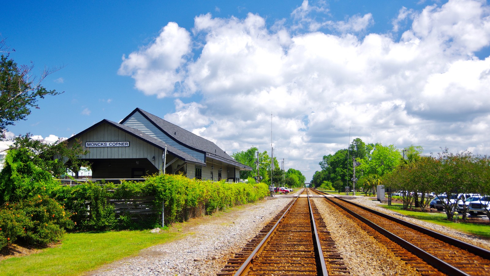 The historic Moncks Corner train depot beside the tracks, built in 1914