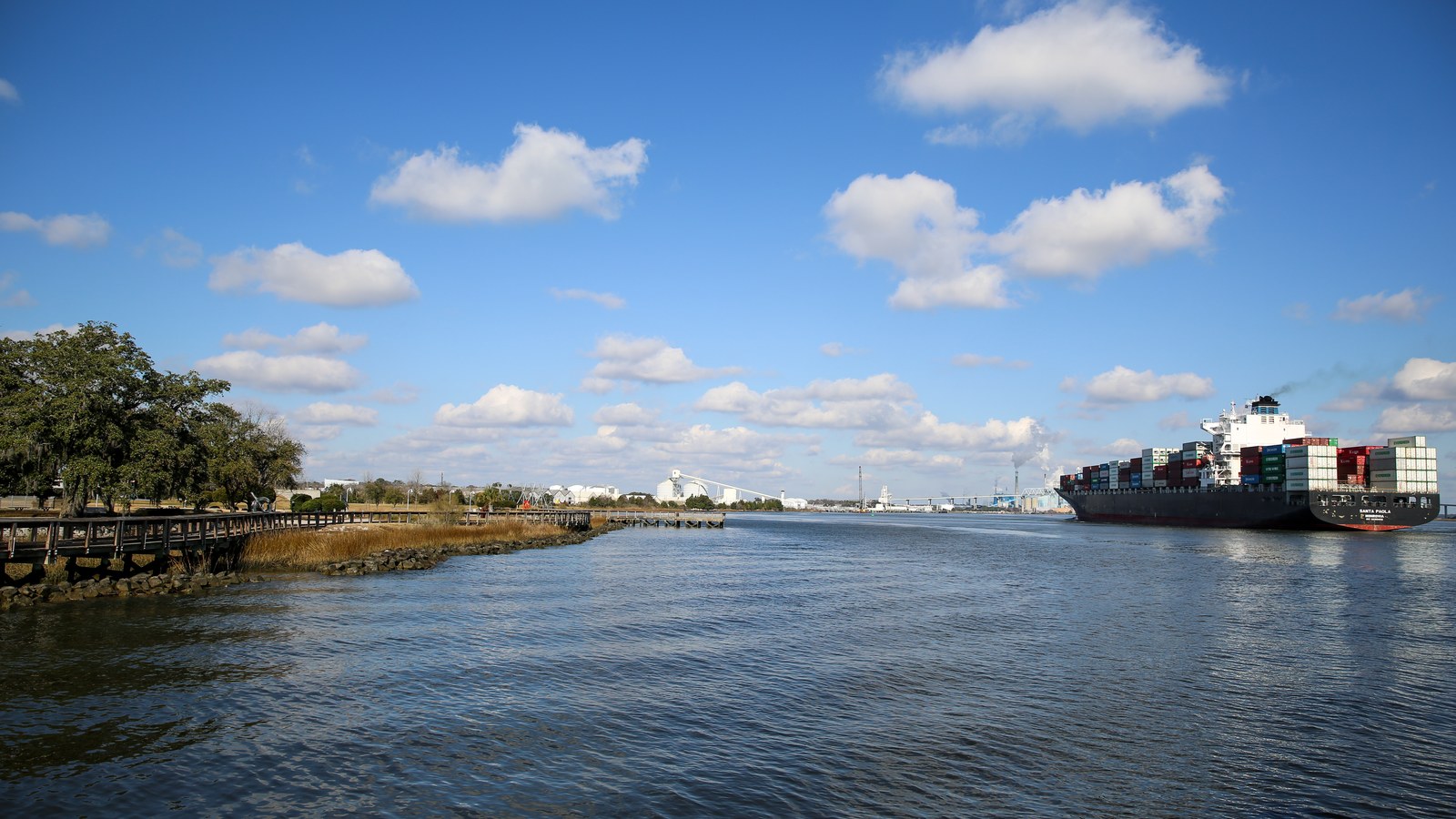 A container ship passing Riverfront Park on the Cooper River, bound for the North Charleston port terminal