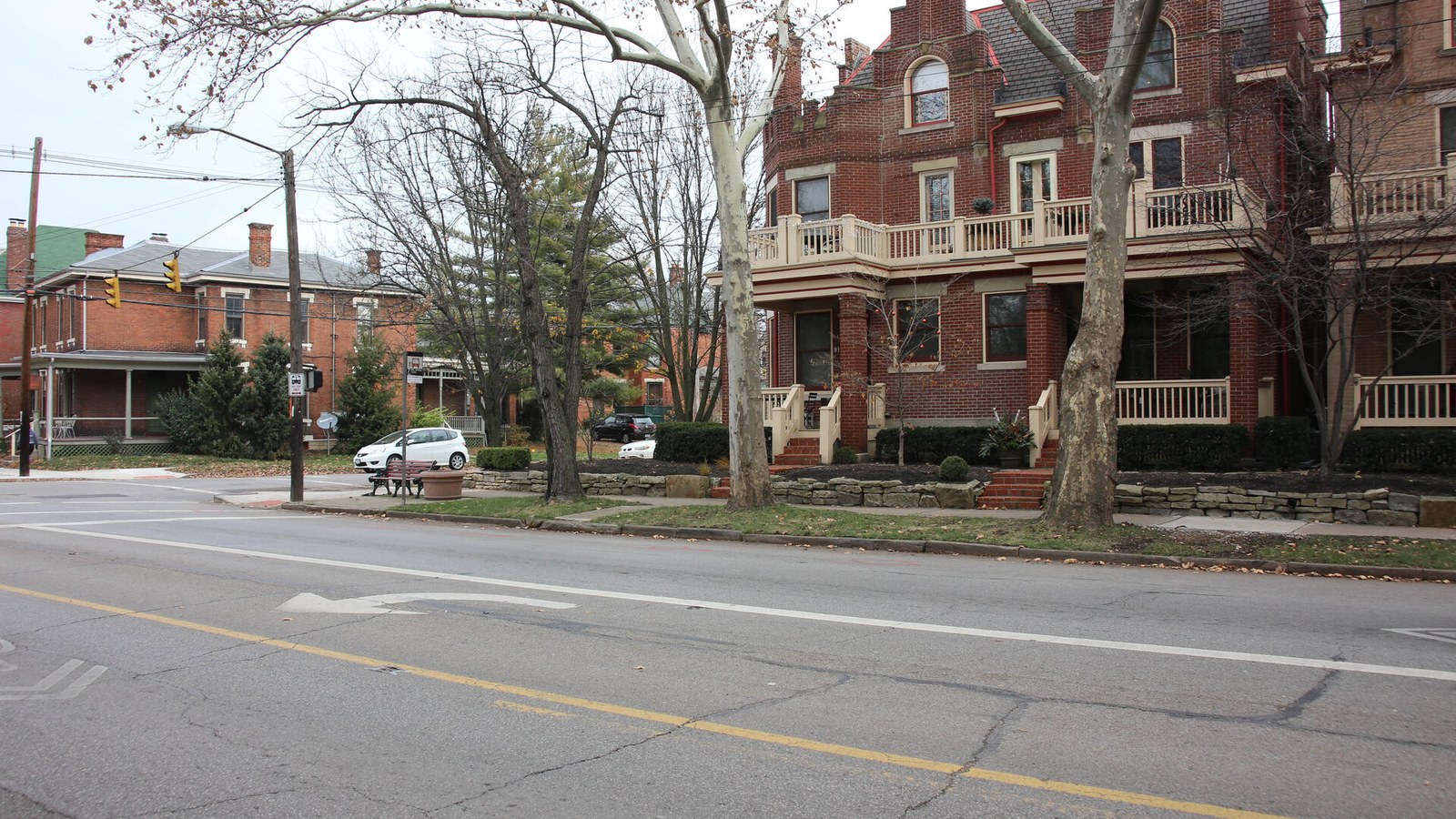 Historic Victorian-era homes on a residential street in Victorian Village, Columbus