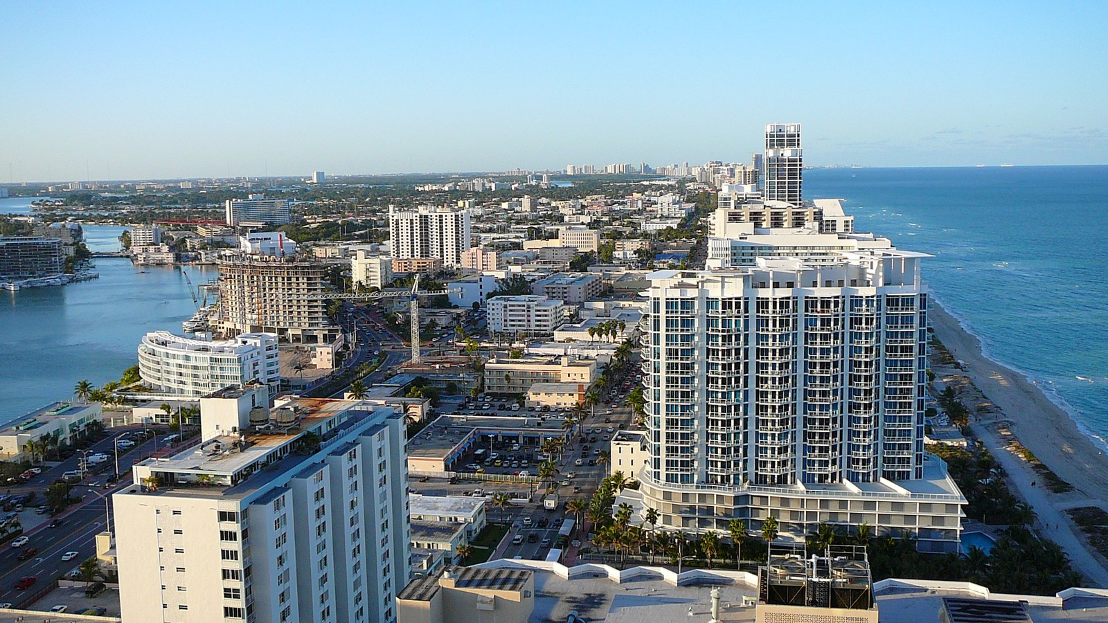 An aerial view of North Beach's low-rise condo towers between Biscayne Bay and the Atlantic Ocean