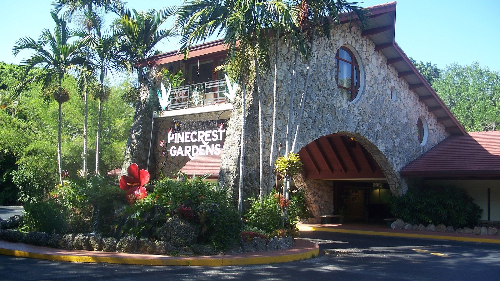 The stone-and-tile entrance to Pinecrest Gardens, the village's botanical garden and former Parrot Jungle site