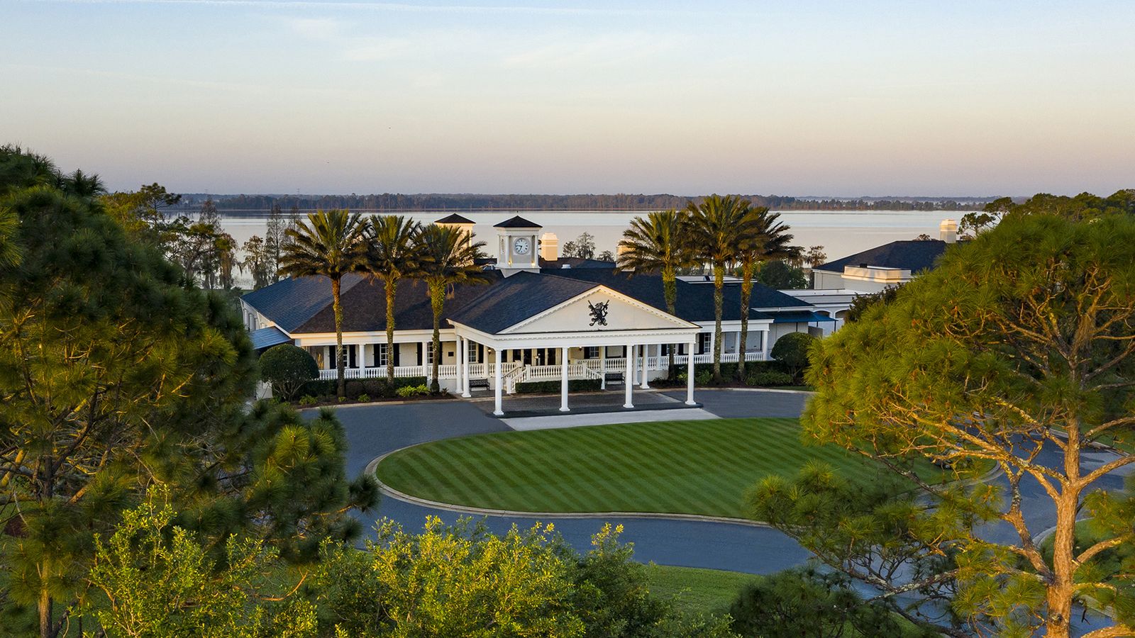 Aerial view of the Lake Nona Golf & Country Club clubhouse at sunset