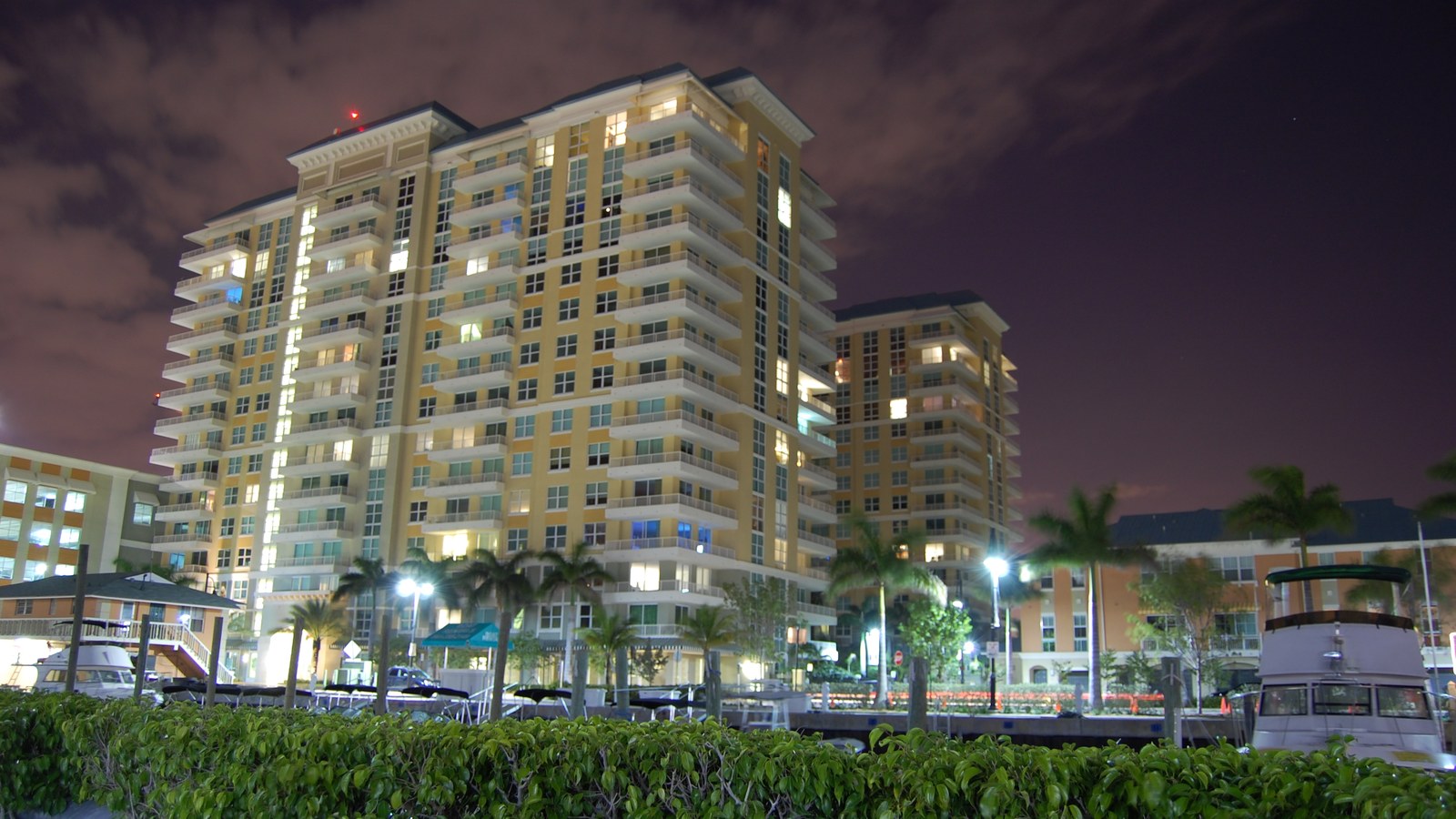 The Marina Village condominium towers overlooking the Boynton Harbor Marina at night
