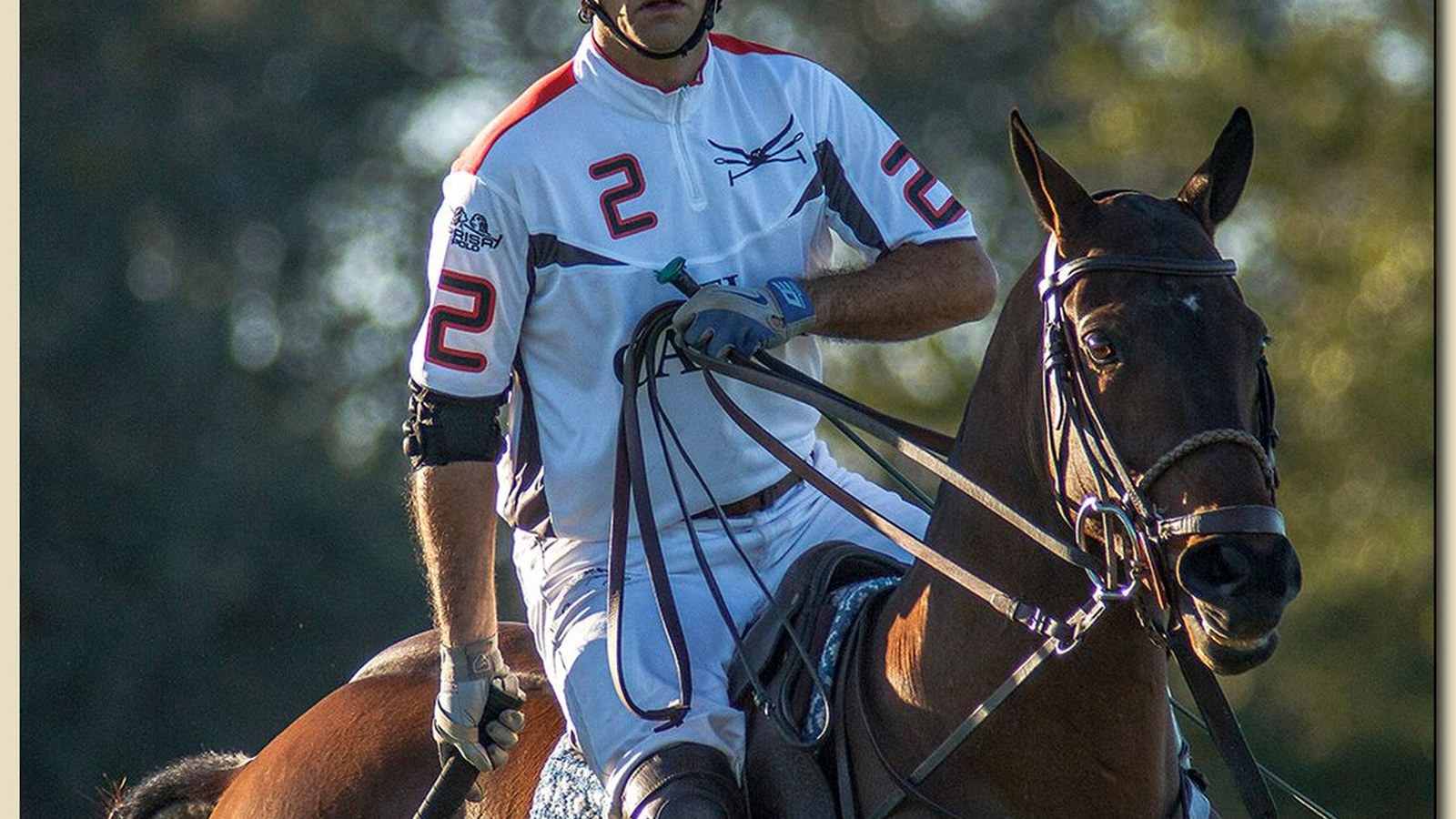 A polo player on horseback in action during a match in Wellington, Florida's equestrian community
