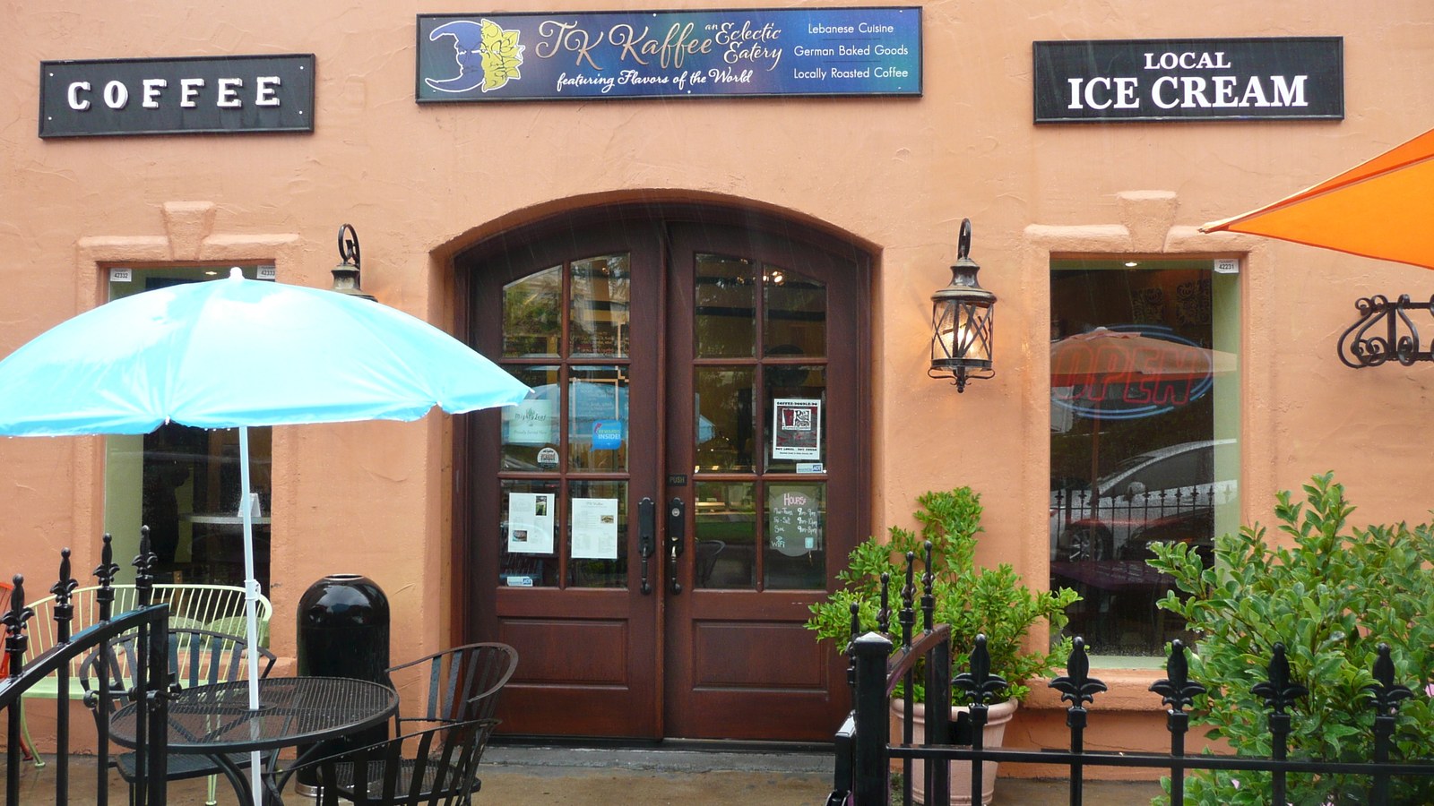 TK Kaffee and Eclectic Eatery storefront with patio seating in the Five Points neighborhood of Raleigh