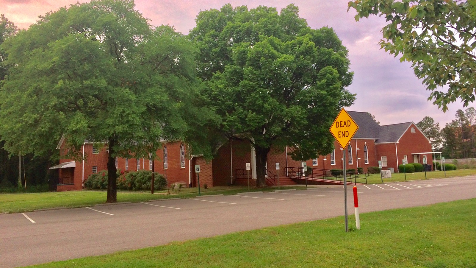 Shiloh Missionary Baptist Church, a brick church in Morrisville's historic Shiloh community, at dusk