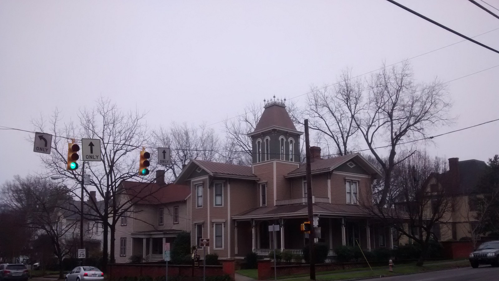 Victorian house with a corner tower at the edge of the Historic Oakwood district in Raleigh