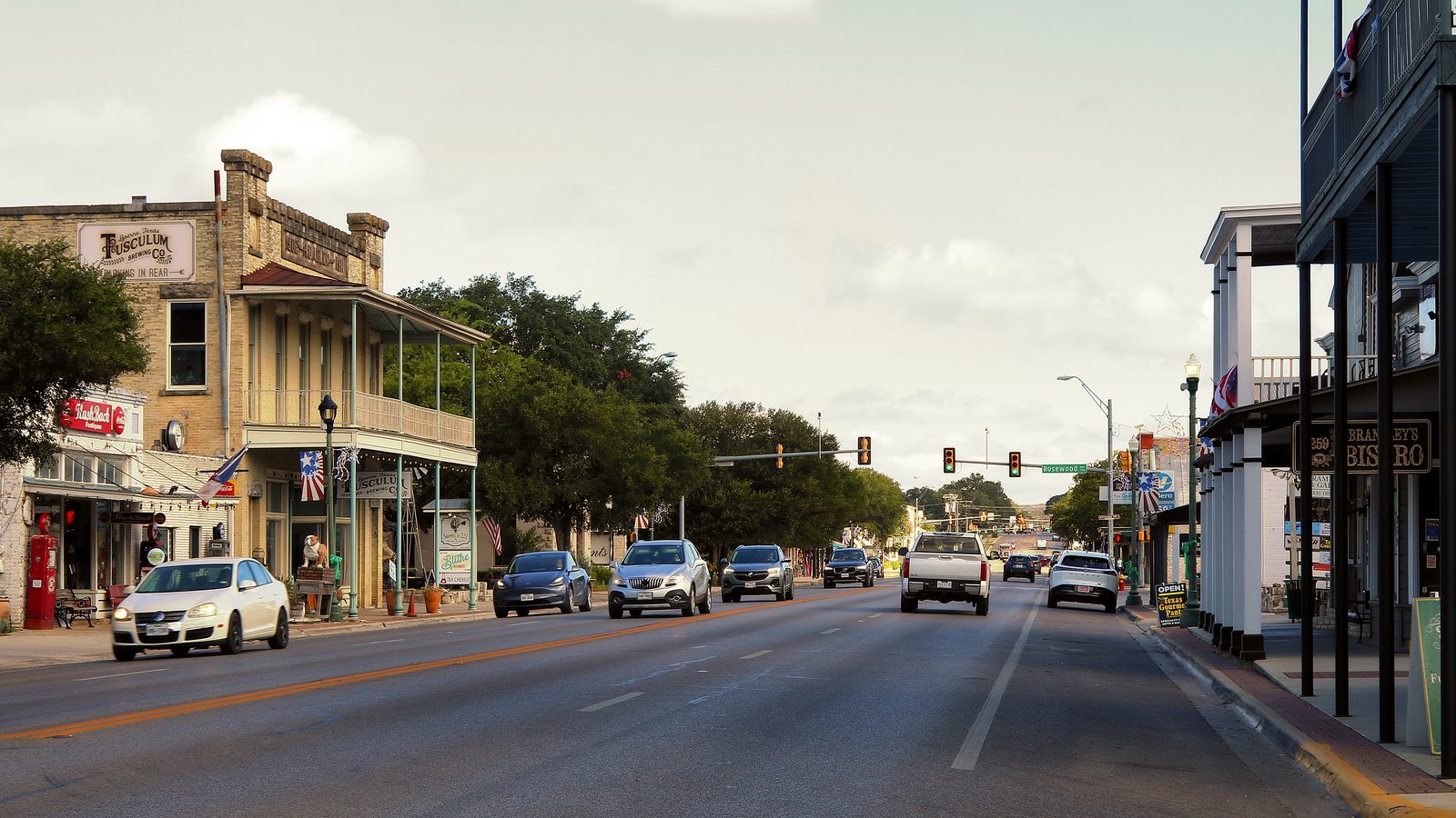 Main Street in Boerne's Hill Country Mile historic downtown, lined with 19th-century limestone storefronts